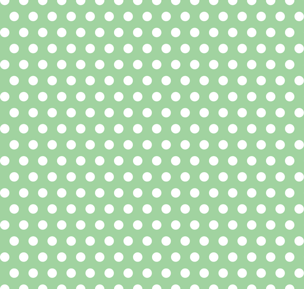 Pale green background with white polka dots in foreground