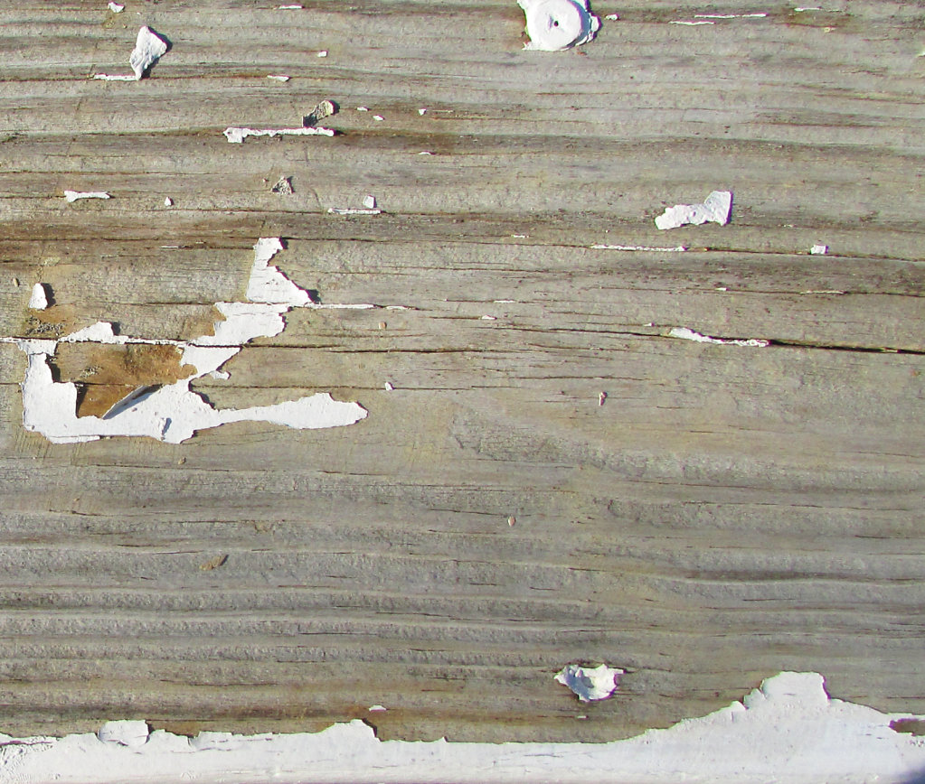Wood with peeling white paint